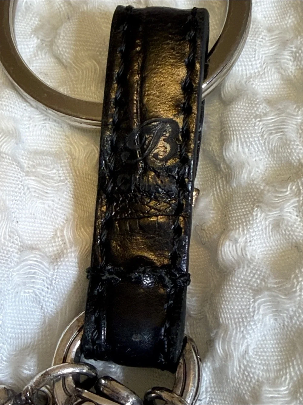 BRIGHTON, Leather and Silver Tone Keychain with Decorative Clip - Black